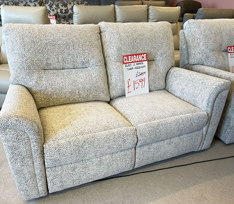 grey 2-seater power sofa in showroom