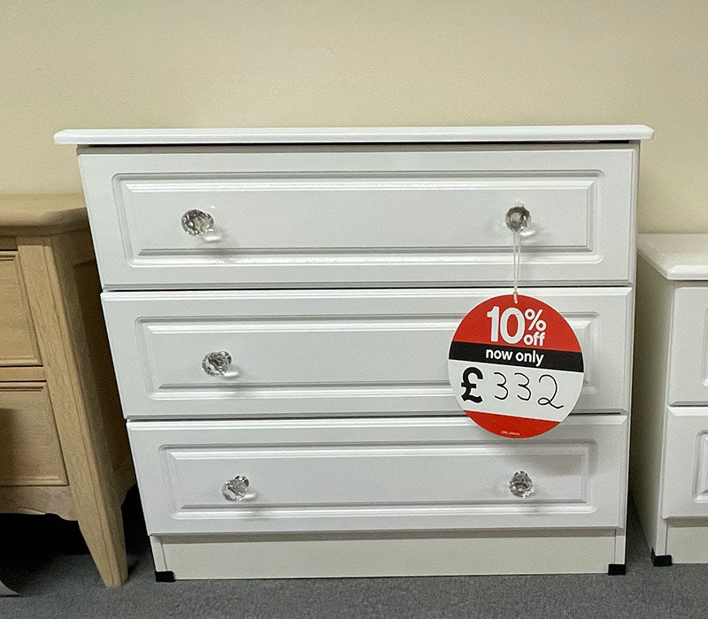 white 3-drawer bedroom cabinet with clear round crystal-like knobs